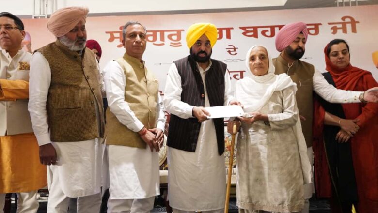 DISTRIBUTES CHEQUES WORTH RS 71 CRORE FOR DEVELOPMENT OG 142 VILLAGES AND TOWNS